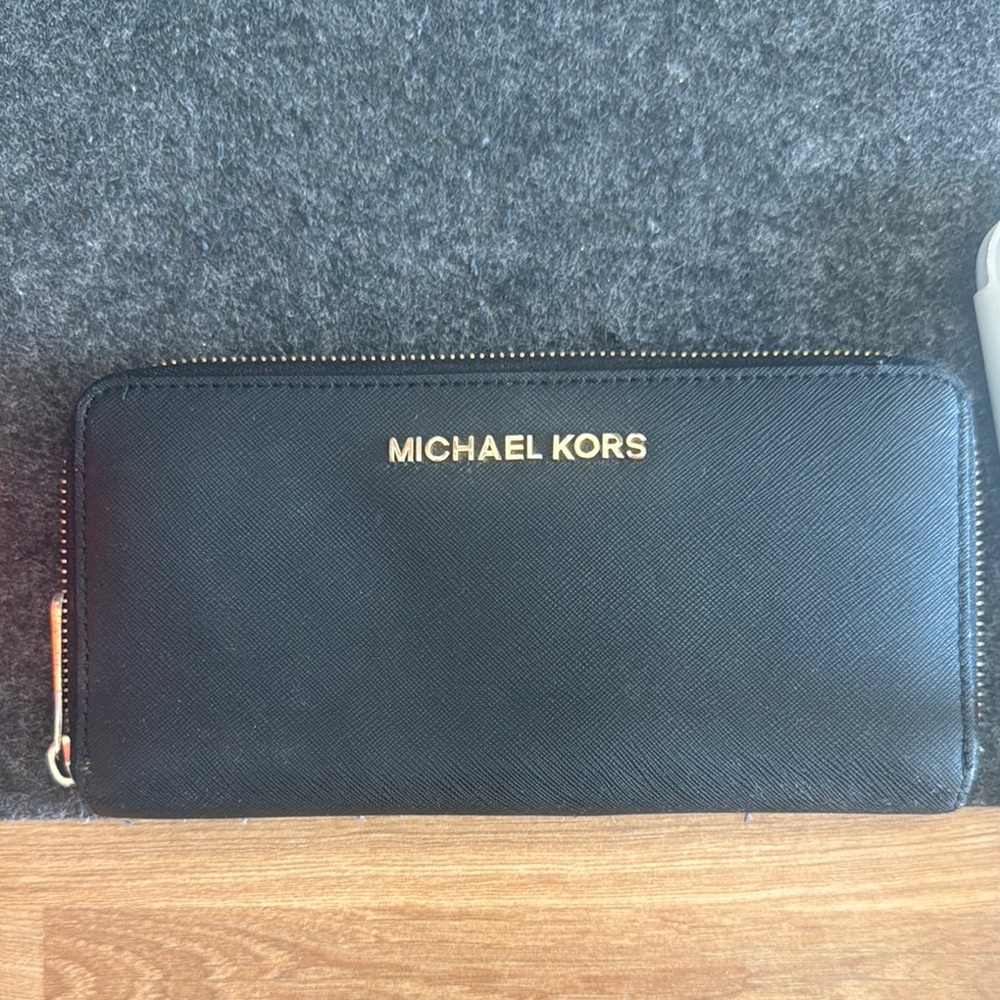 Michael Kors Black and Gold Zip Wallet